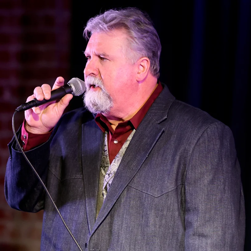 Dave Edwards performing on stage